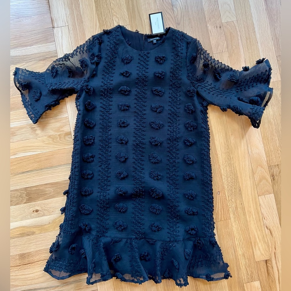 Boutique Shift Dress with raised Puff detailing.  Size medium